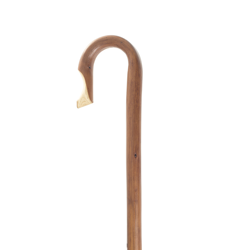 crook handle chestnut walking stick with part of the handle carved out