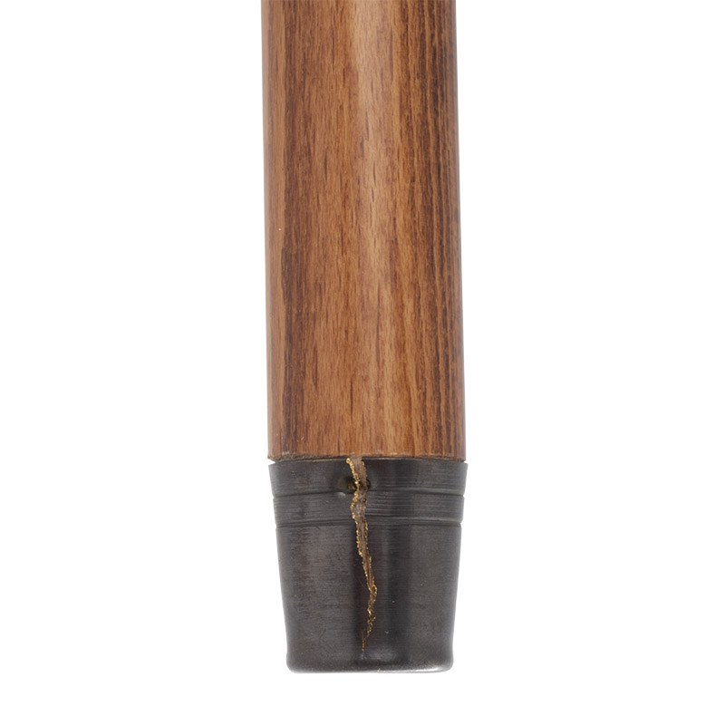 This stick features a damaged ferrule