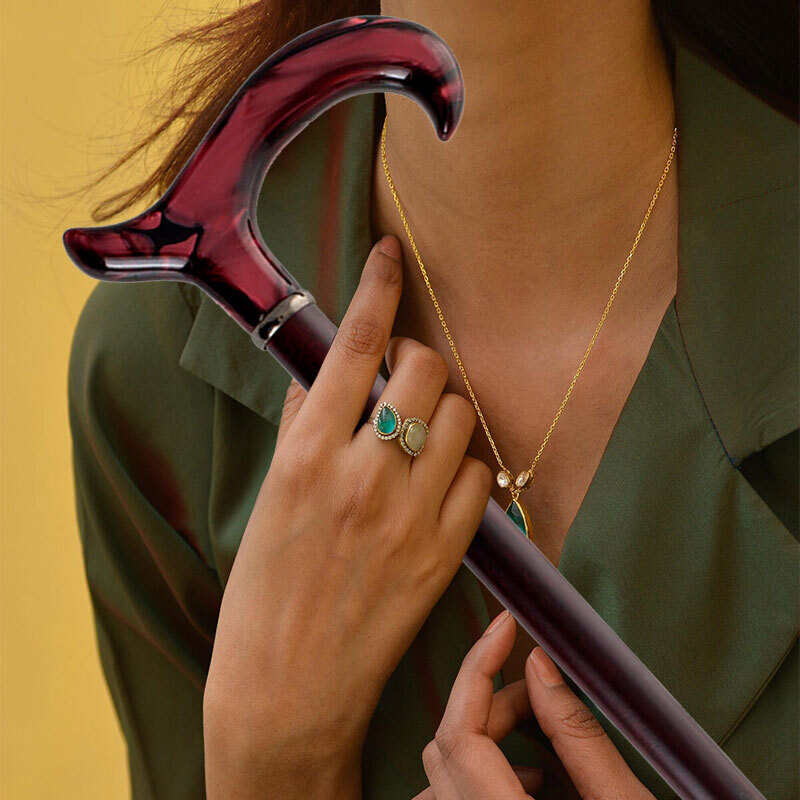 How to Accessorise Emerald Jewellery with a Walking Stick