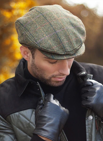 The Dents Tweed Flat Cap is ideal for a country stroll